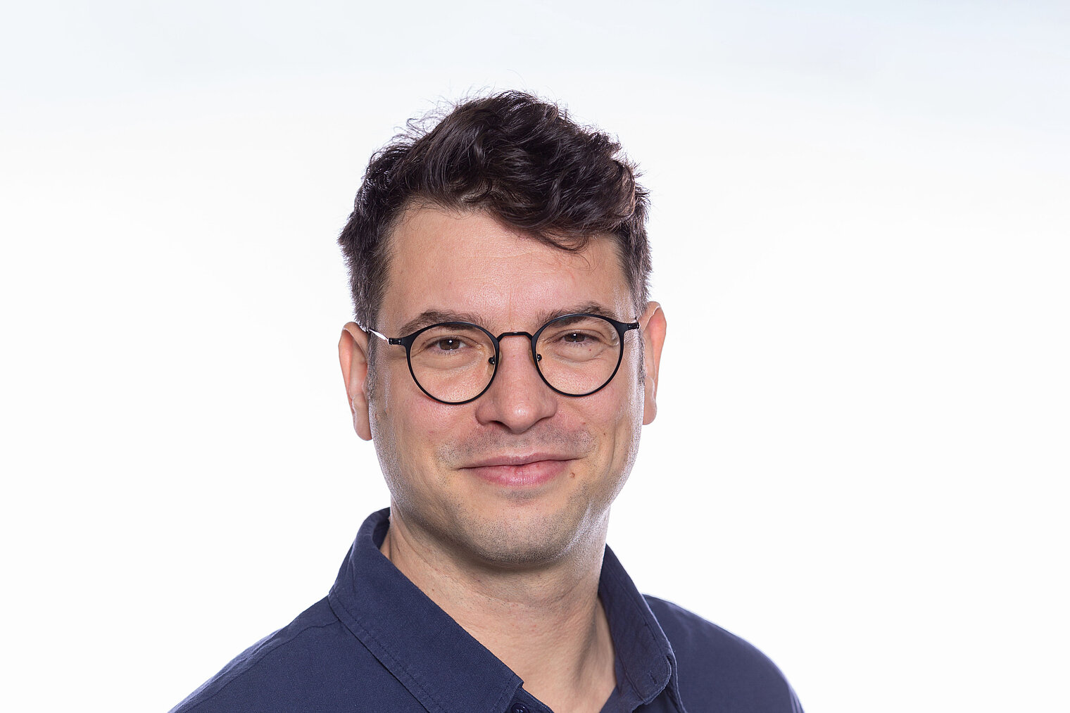 Portrait of Milan Gerovac in front of a light background
