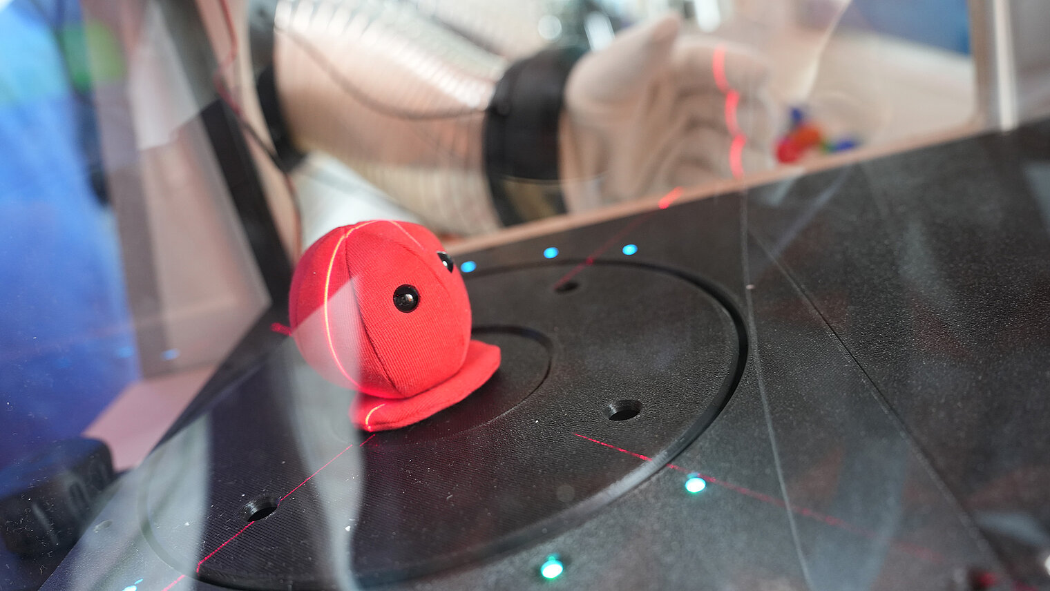 A view inside the MYXO-MAT-3000 with an object on a black background 