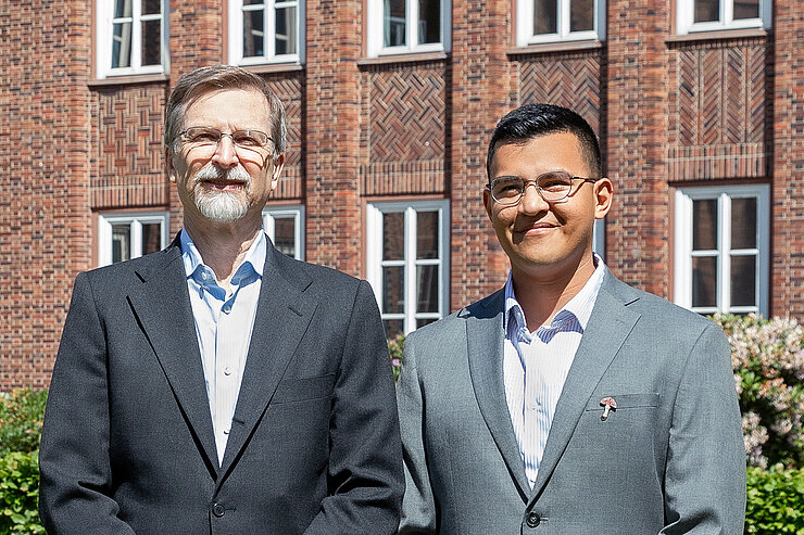 Portrait of Craig Crews and Esteban Charria-Giron