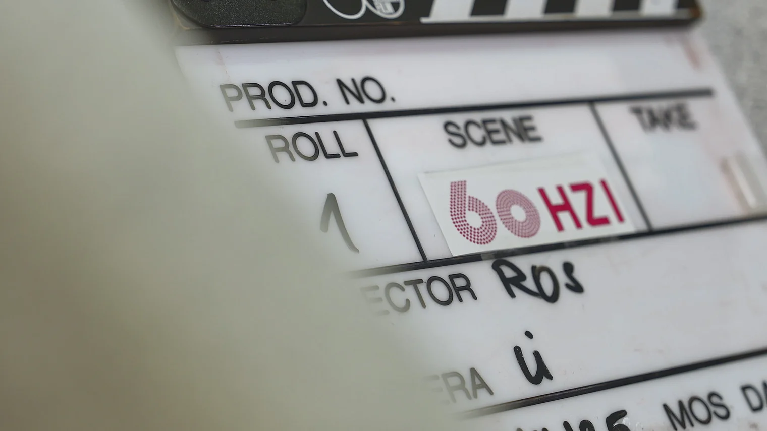 Filmklappe mit Beschriftung"60HZI"